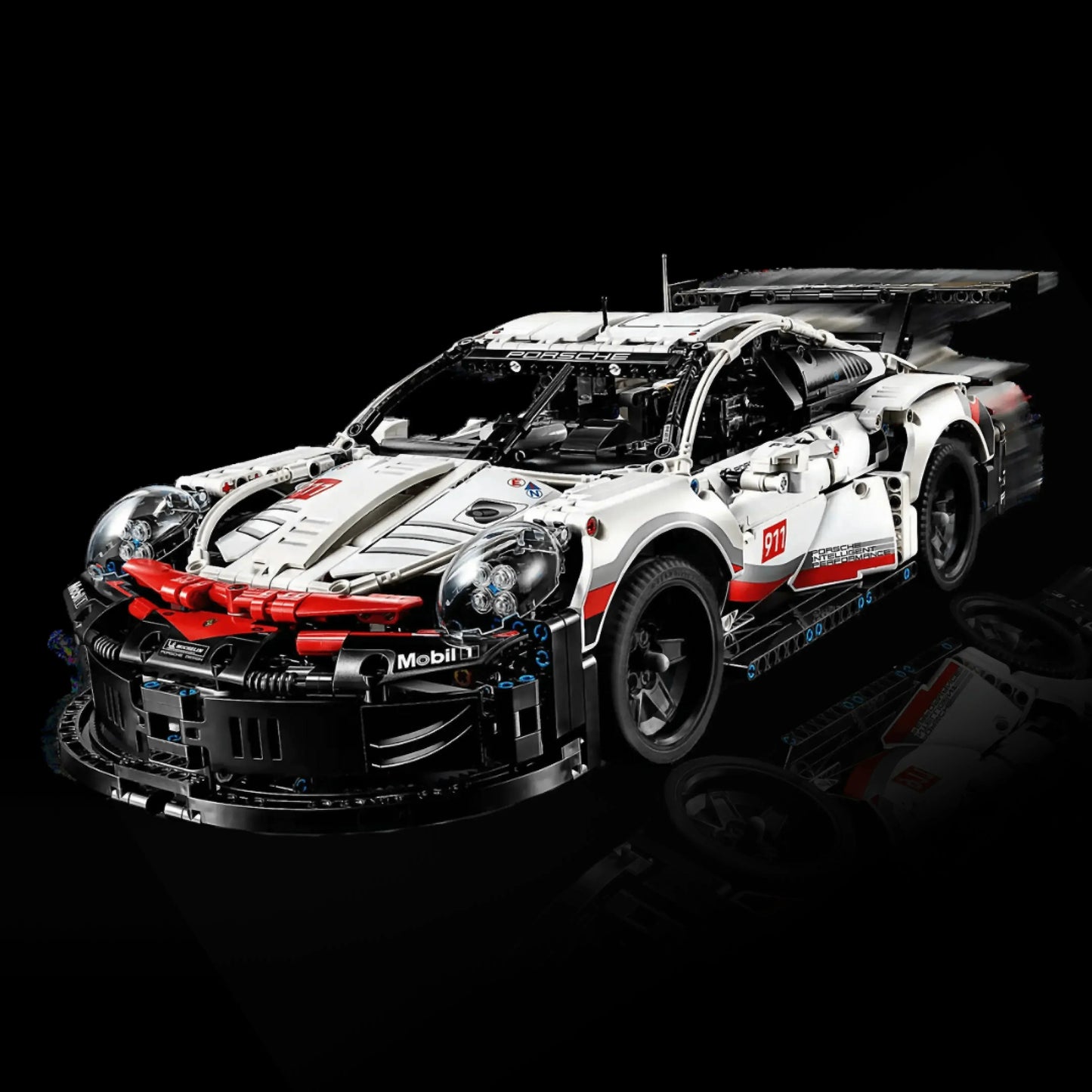 Buy the Porsche 911 RSR and Get an Electric Motor or Lighting Kit for Free! ATTENTION: THIS PRODUCT IS NOT FROM THE LEGO BRAND, BUT IS A 100% IDENTICAL REPLICA