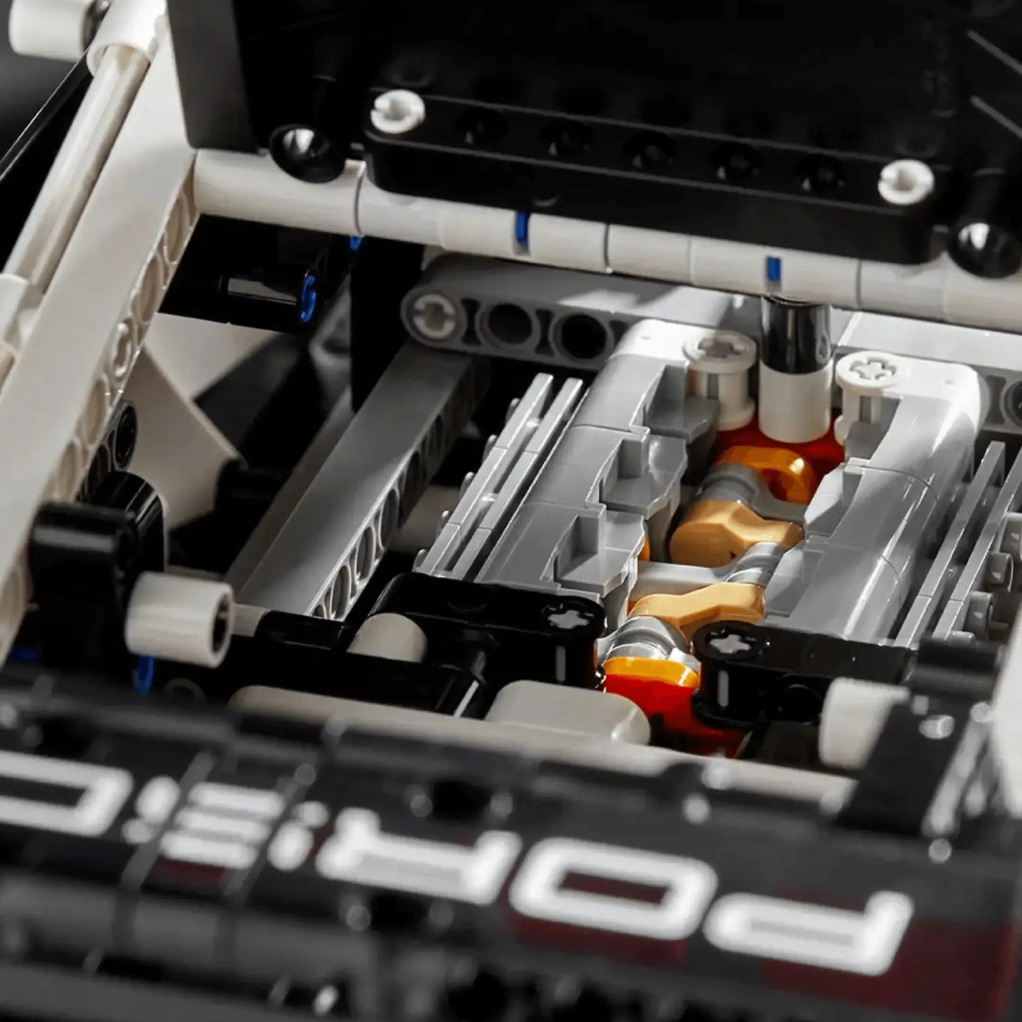 Buy the Porsche 911 RSR and Get an Electric Motor or Lighting Kit for Free! ATTENTION: THIS PRODUCT IS NOT FROM THE LEGO BRAND, BUT IS A 100% IDENTICAL REPLICA